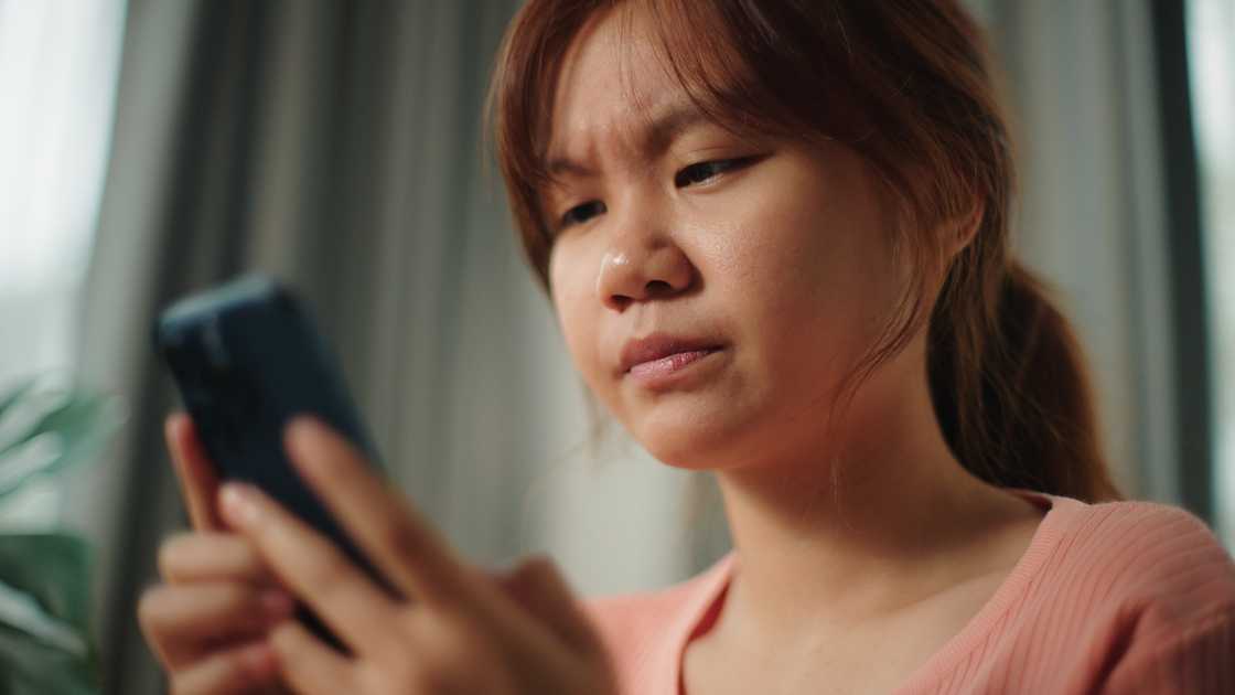 A sad woman on video call A sad woman on video call