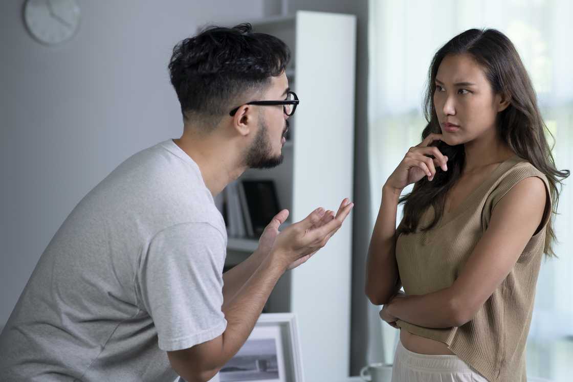 A man and woman arguing and blaming each other A man and woman arguing and blaming each other