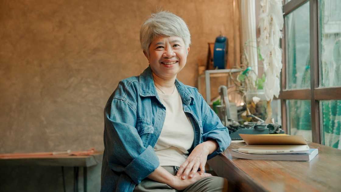 A woman talking with someone at home A woman talking with someone at home