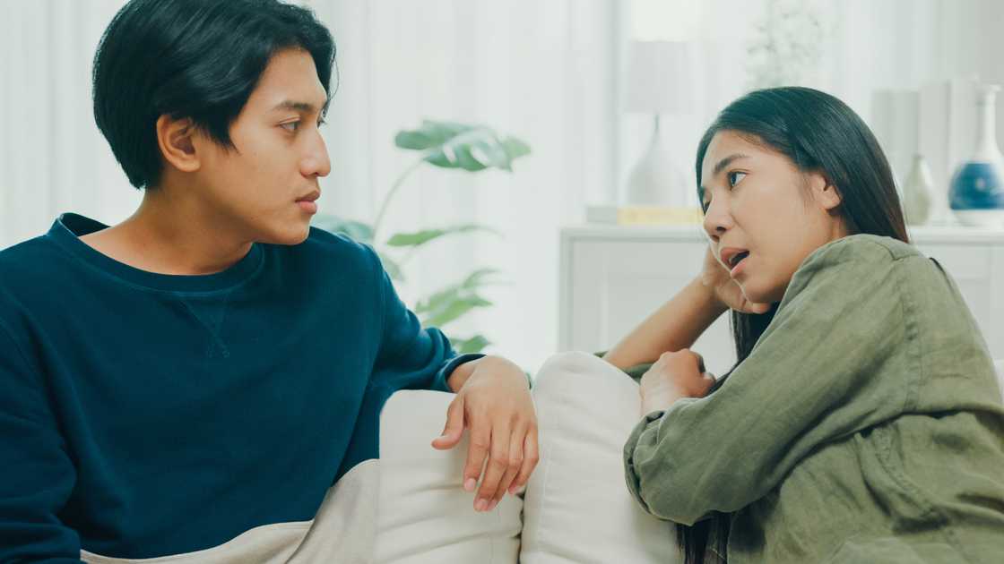 A couple in a serious conversation A couple in a serious conversation