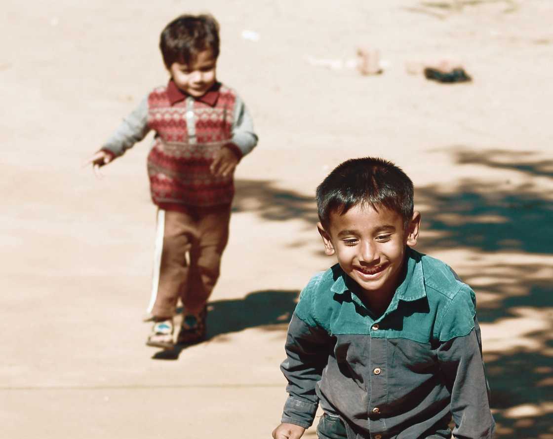 Two young boys playing Two young boys playing