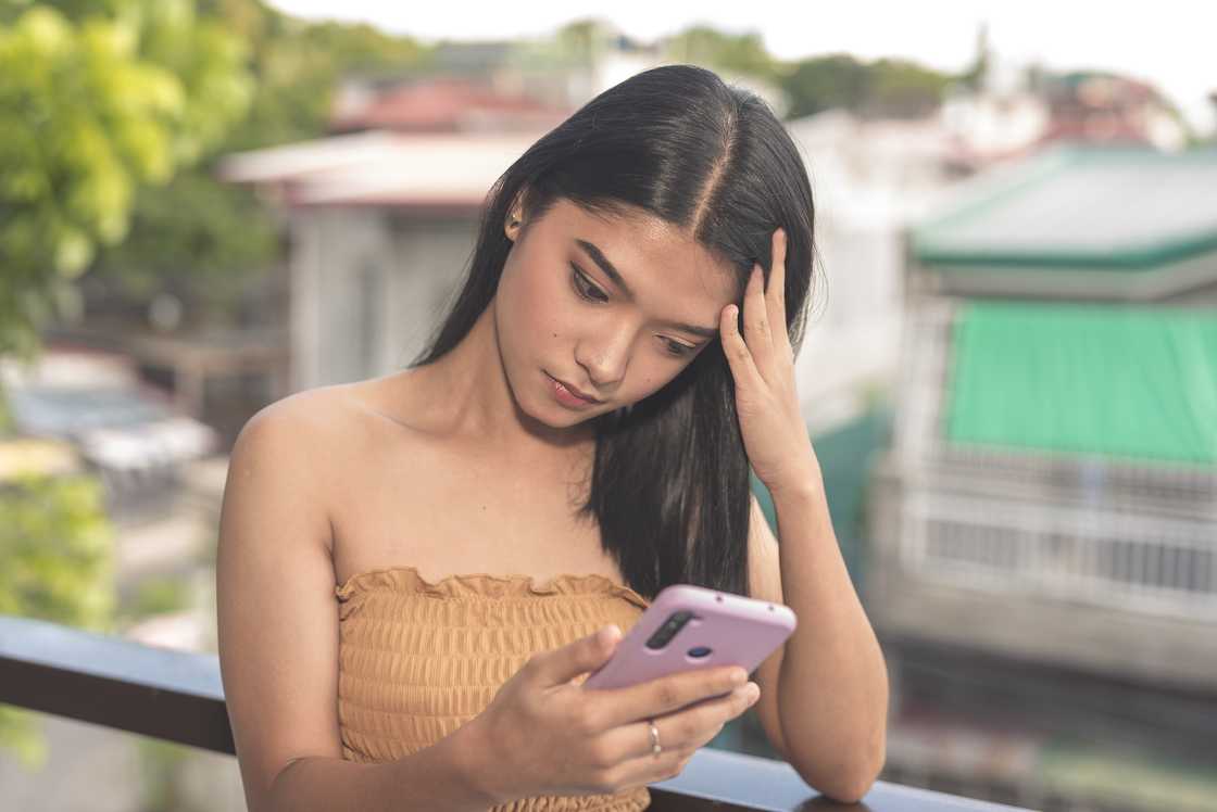 A woman looking at her phone A woman looking at her phone