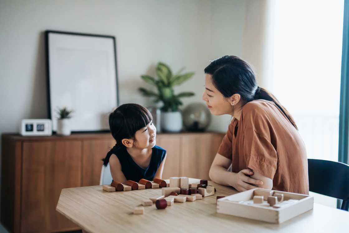 A mother and daughter are talking