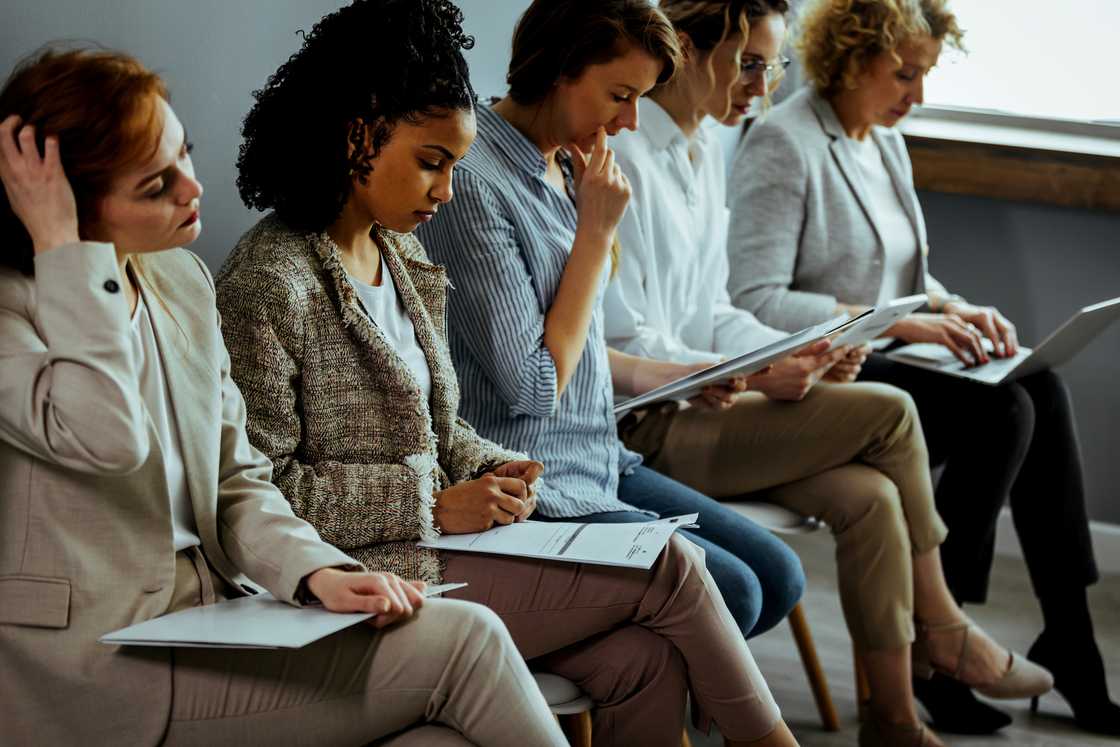 Job applicants in waiting room before an interview Job applicants in waiting room before an interview