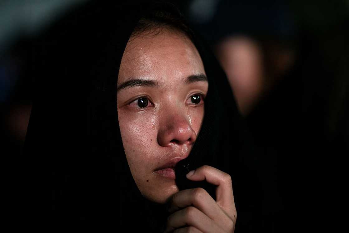 Woman mourns death of a loved one