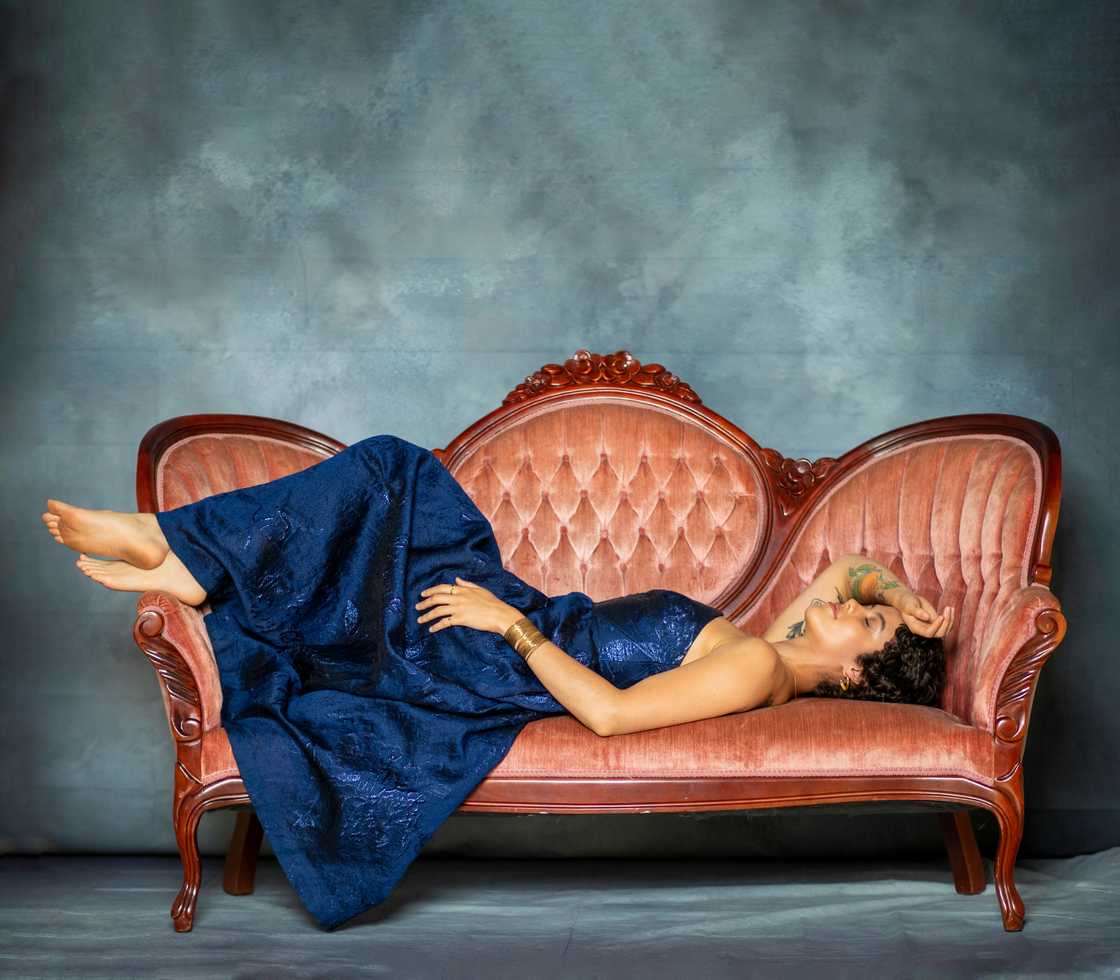 A lady relaxing on sofa