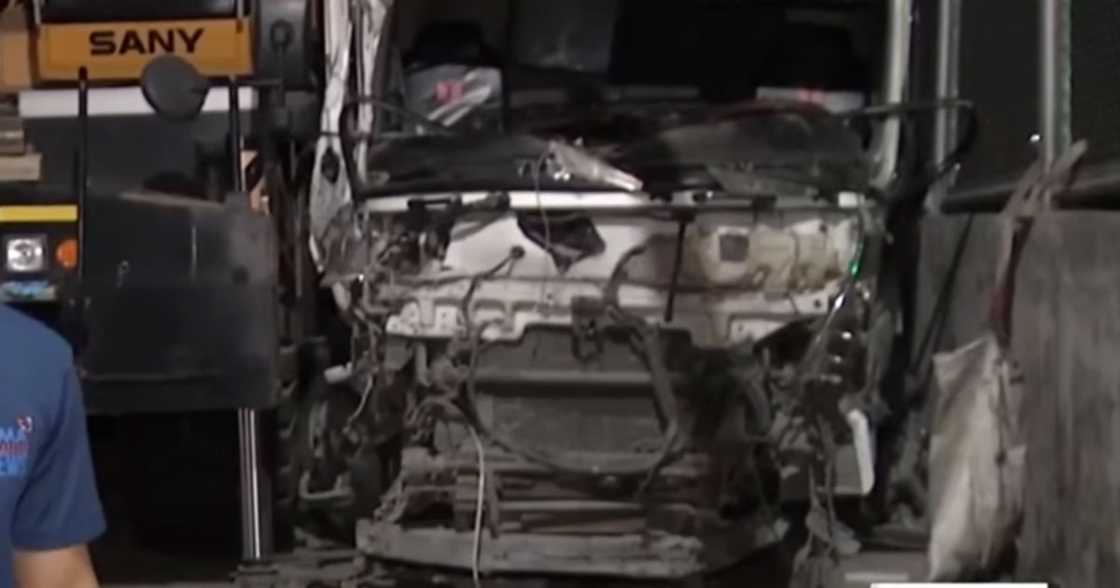 A dump truck hit a concrete barrier in Quezon City.