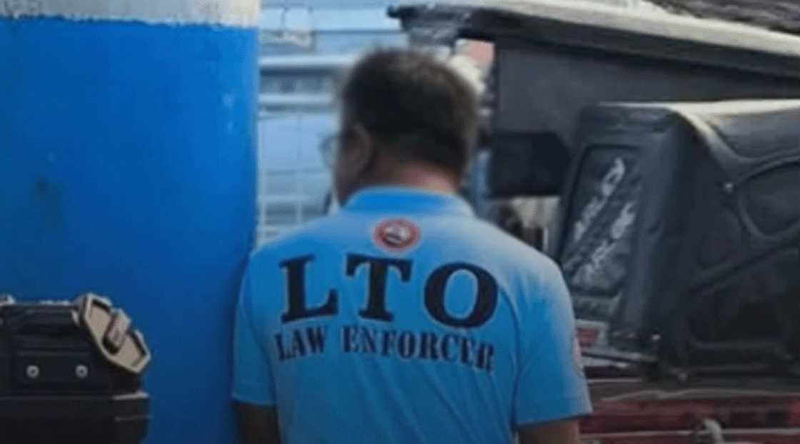 LTO enforcer caught "hiding" behind post in Taytay faces probe