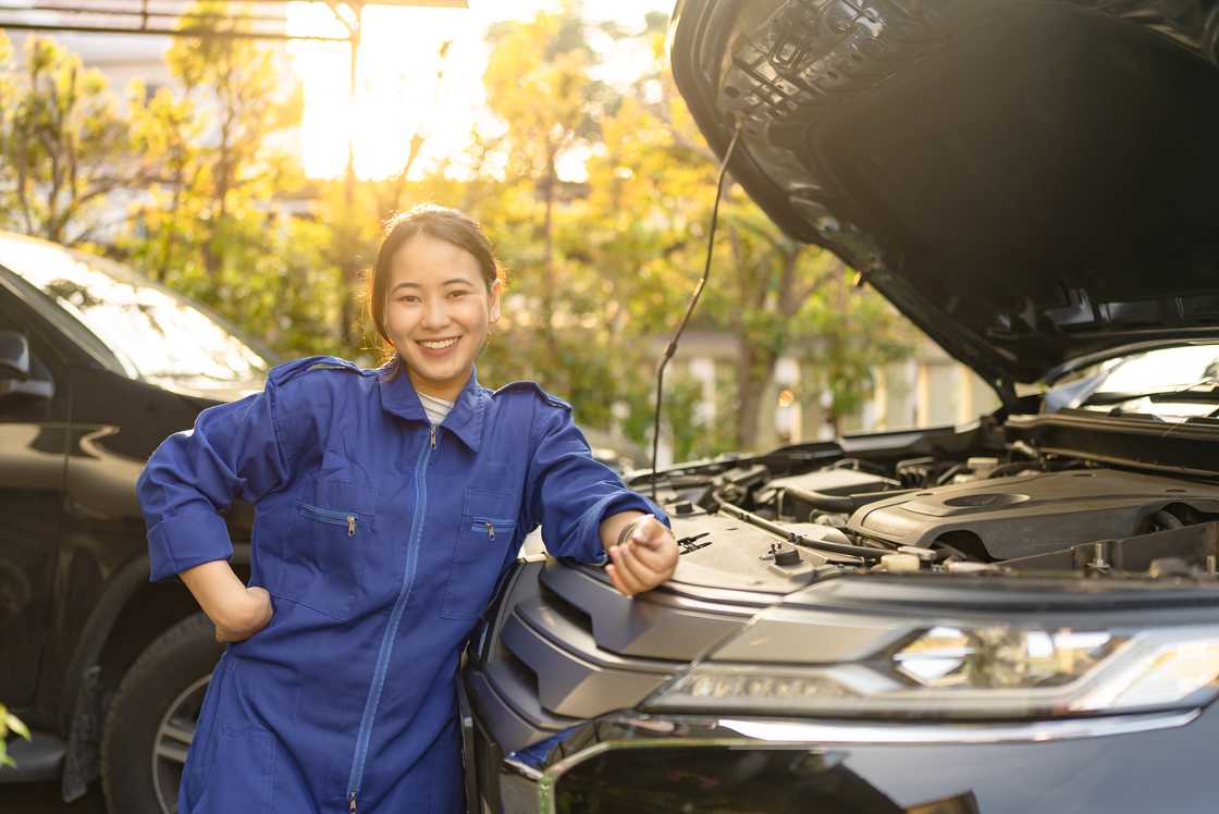 A female car mechanic A female car mechanic