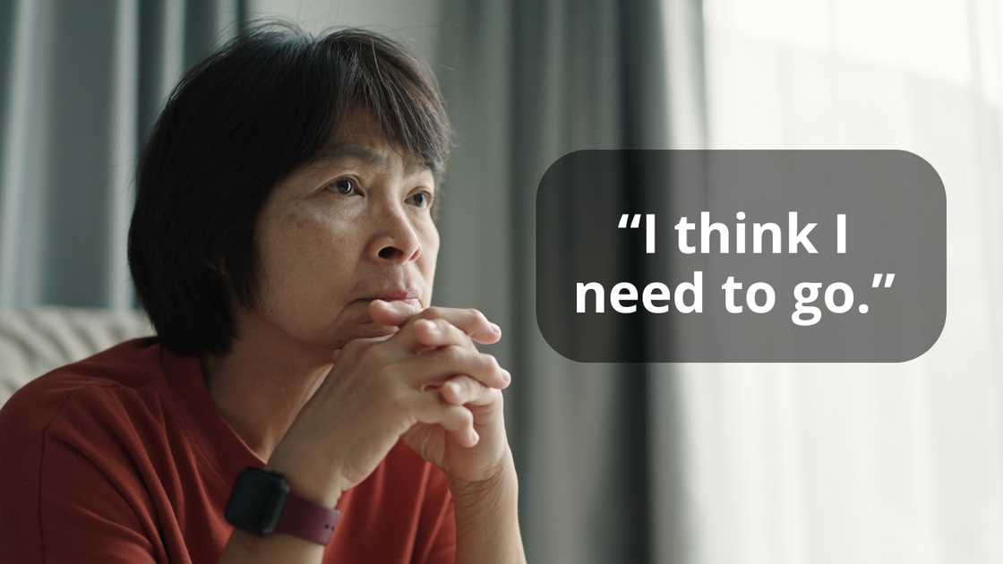 A thoughtful woman watching football