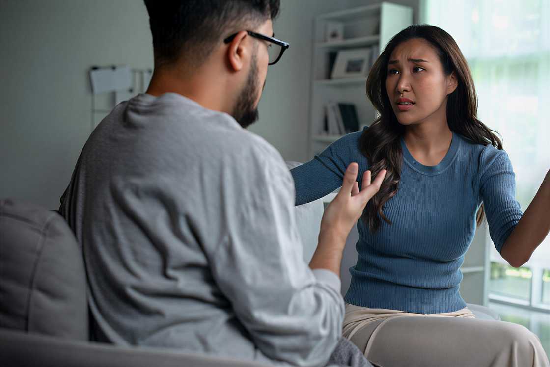 A husband and wife are fighting A husband and wife are fighting
