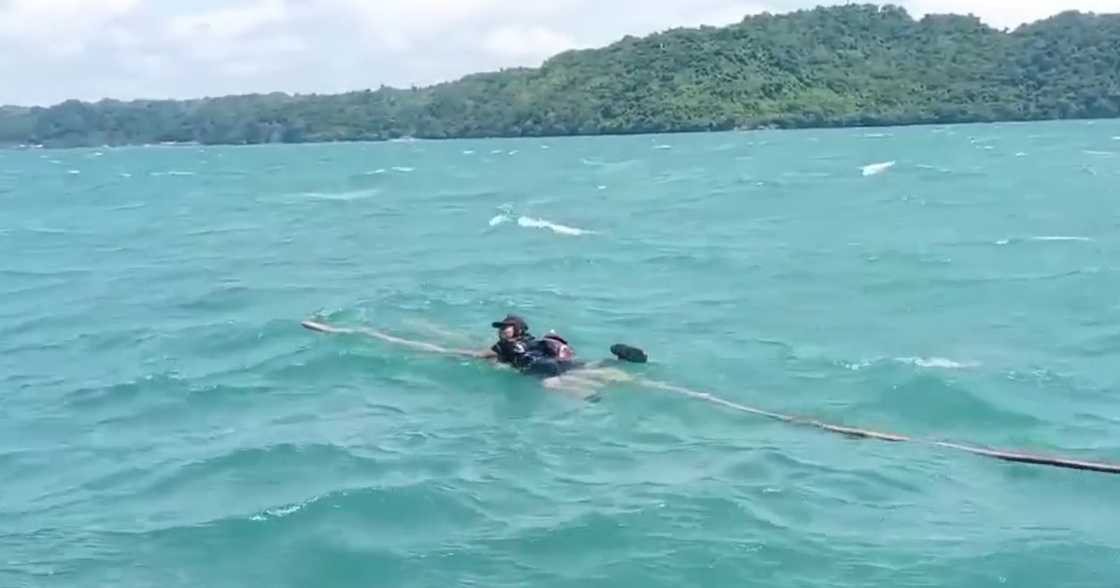 Coast Guard intercepts man's risky journey across the busy Iloilo Strait to Guimaras Island Coast Guard intercepts man's risky journey across the busy Iloilo Strait to Guimaras Island