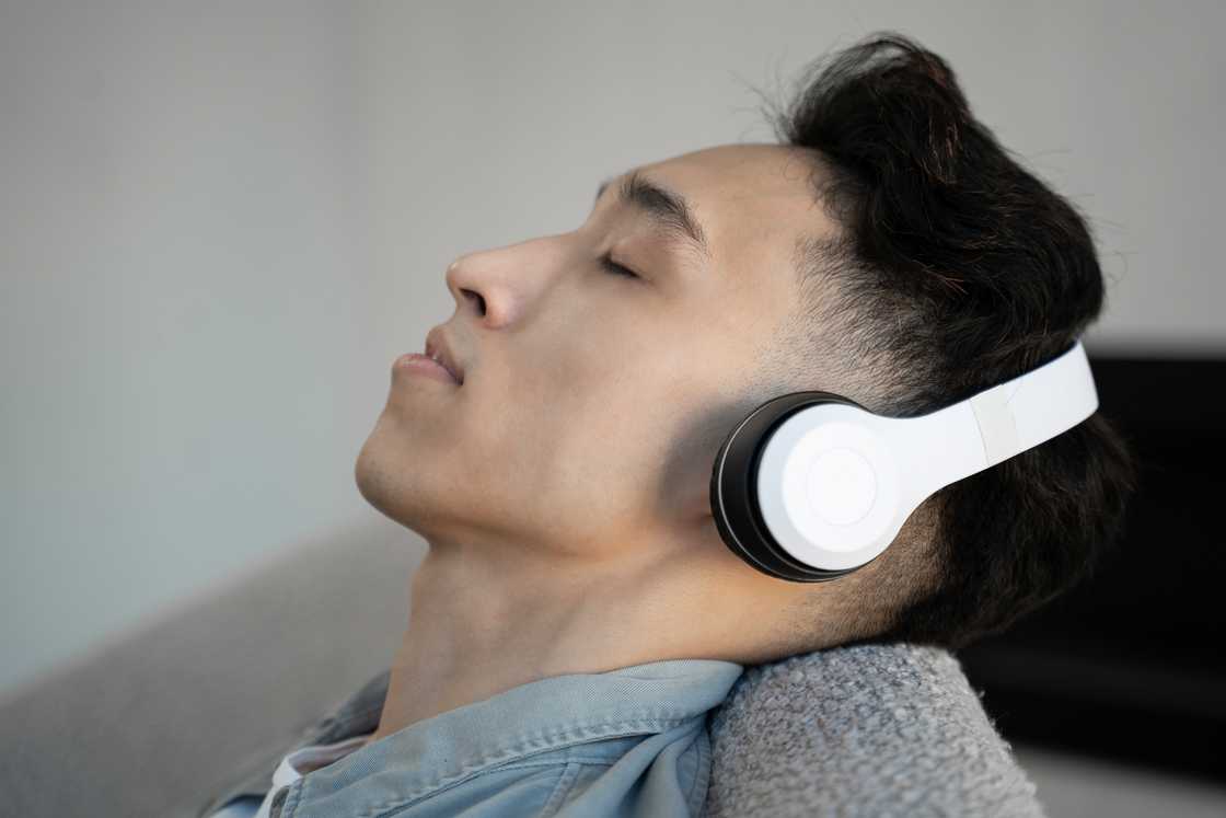 A man using headphones A man using headphones