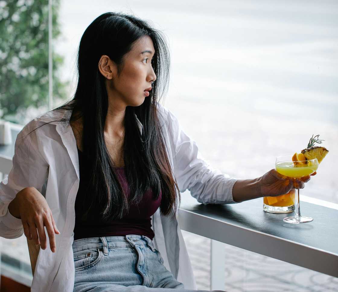 A relaxed woman having wine A relaxed woman having wine