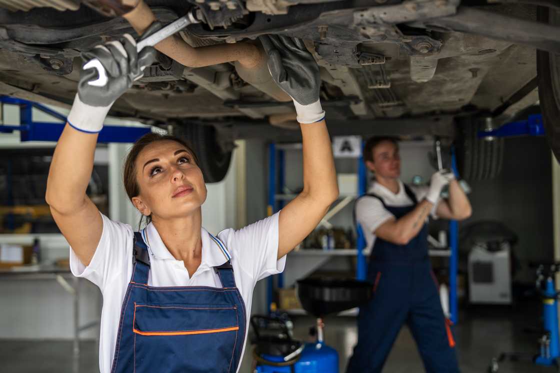 A female car mechanic A female car mechanic
