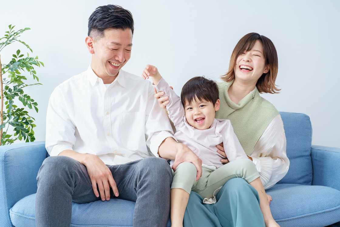 A couple and their young son