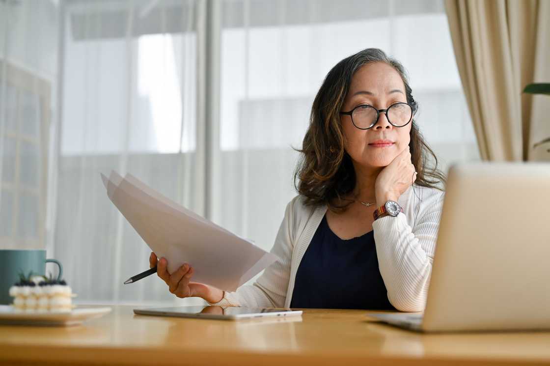 a senior woman using a laptop