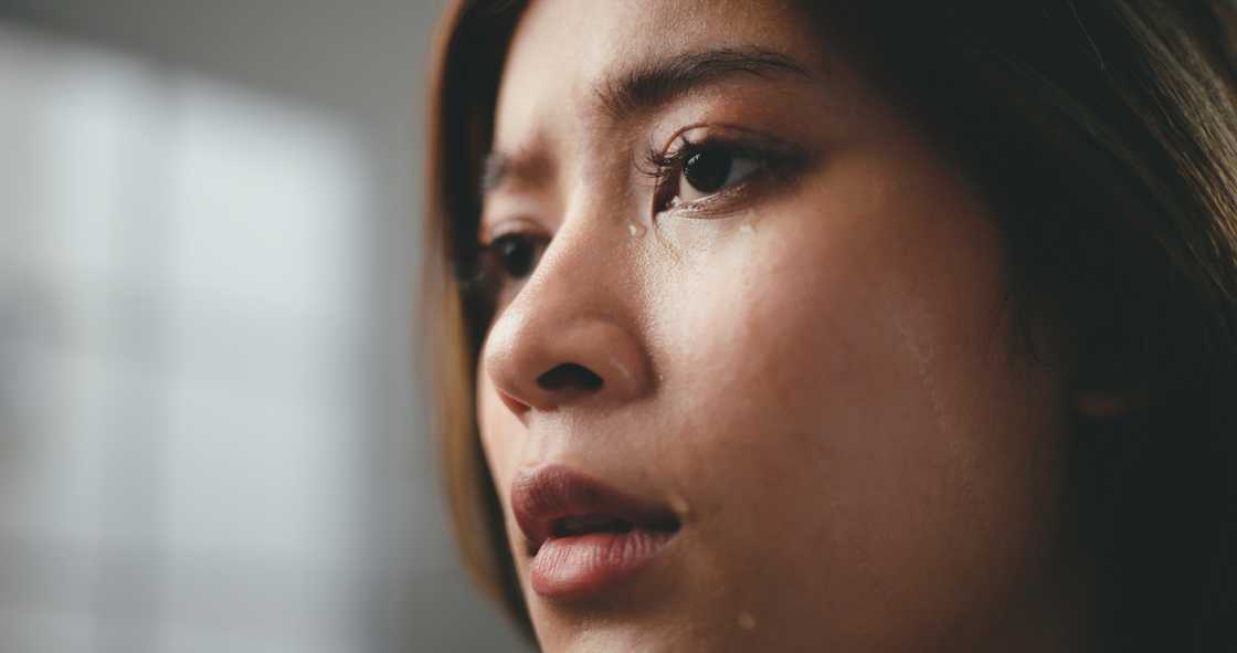 A woman talking with tears A woman talking with tears
