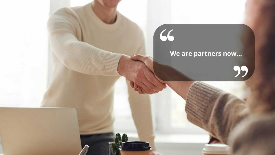 A man and woman shaking hands A man and woman shaking hands