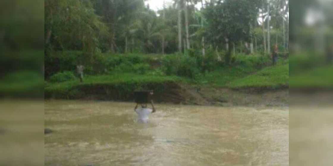 Teacher crosses dangerous rivers to bring modules to students in remote areas