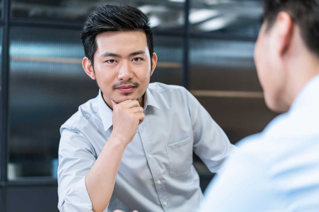 a man talking in the office