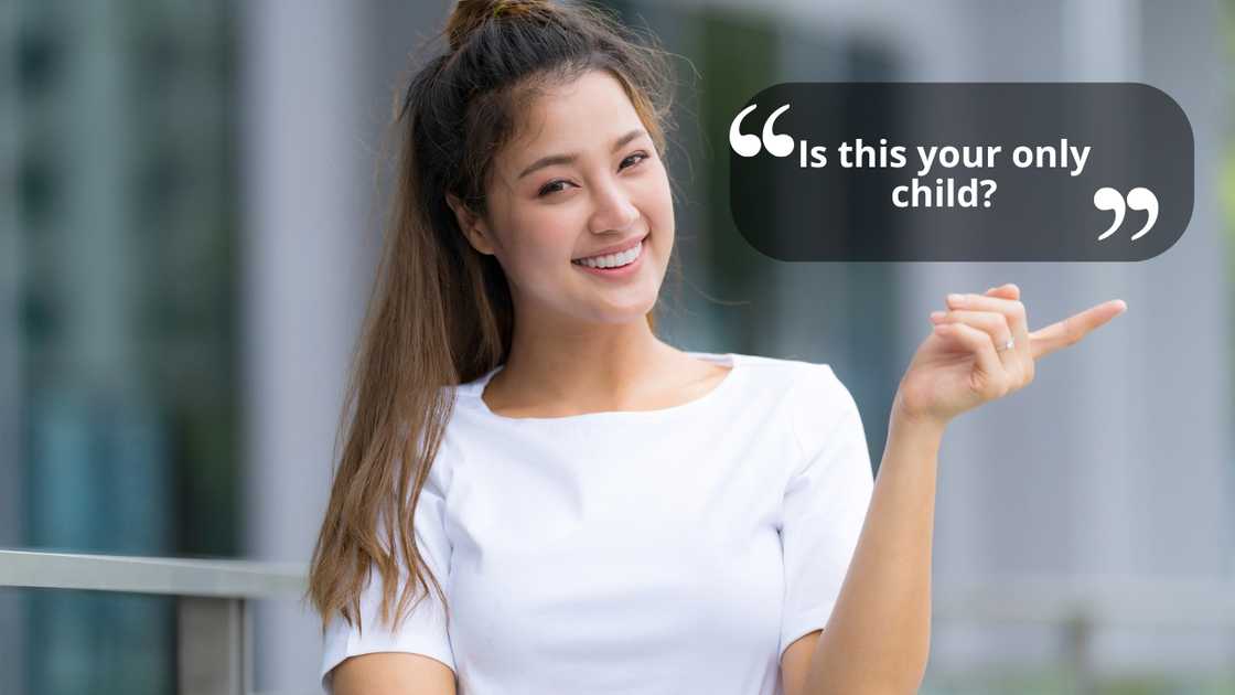 A young woman pointing with her index finger A young woman pointing with her index finger