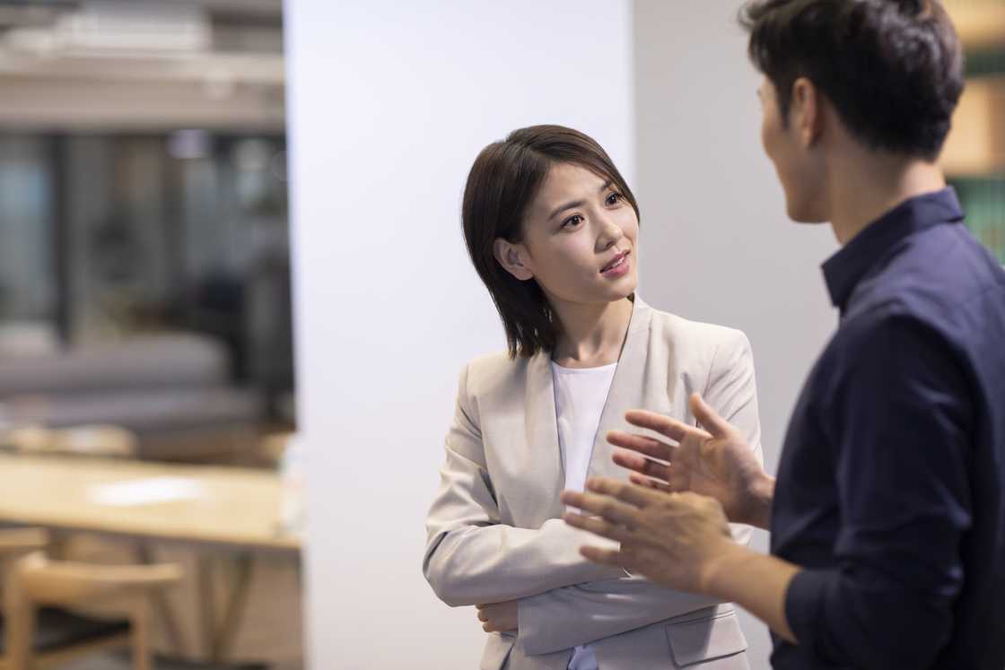 A lady and man are talking