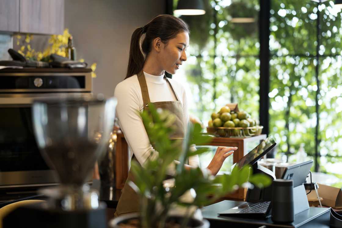 A busy cashier in a supermarket