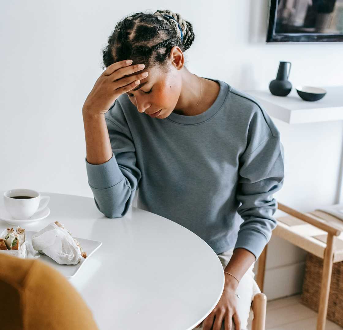 Stressed woman in a restaurant