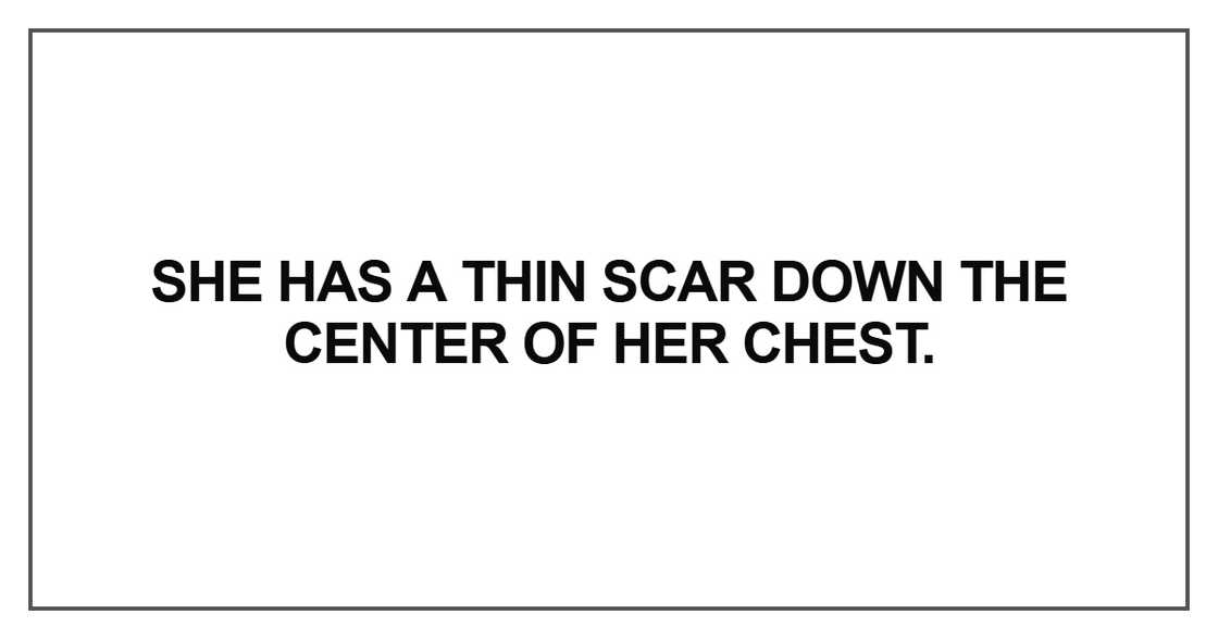 She has a thin scar down