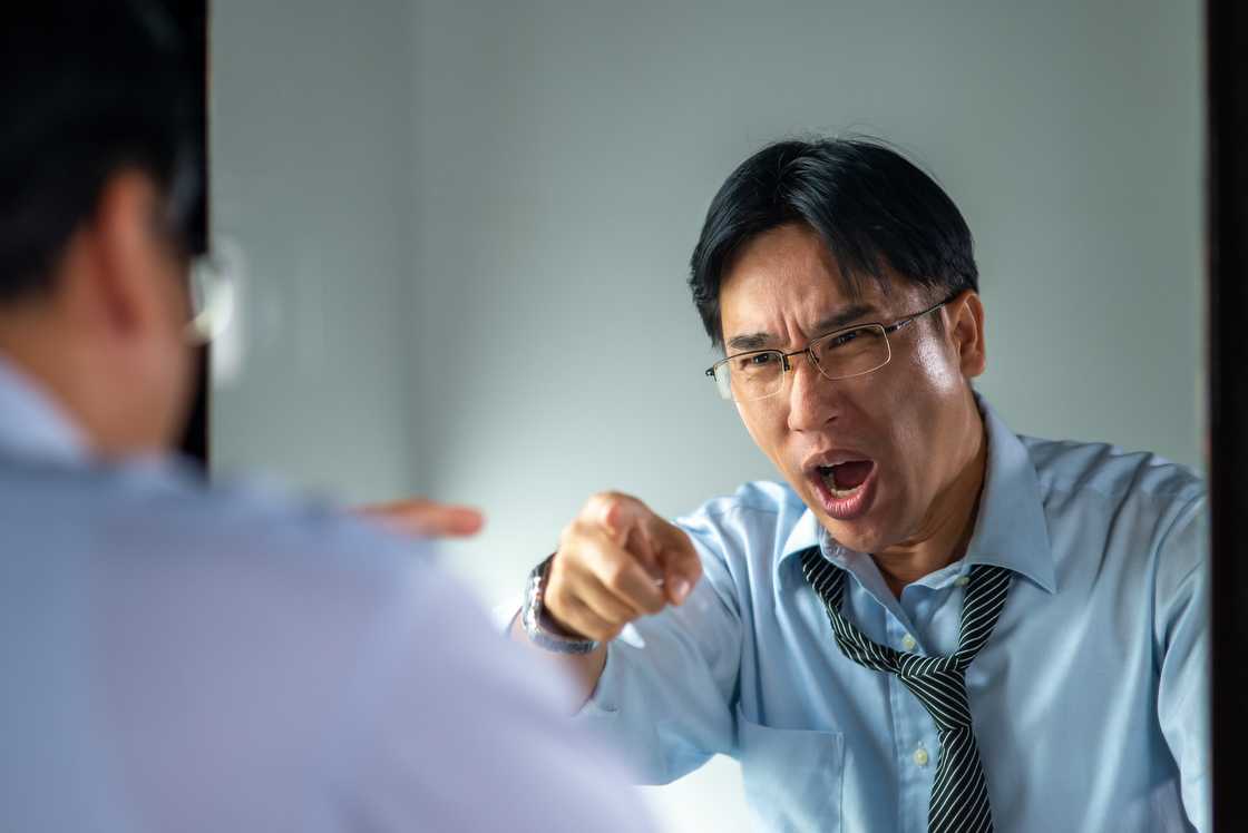 A furious man complaining A furious man complaining