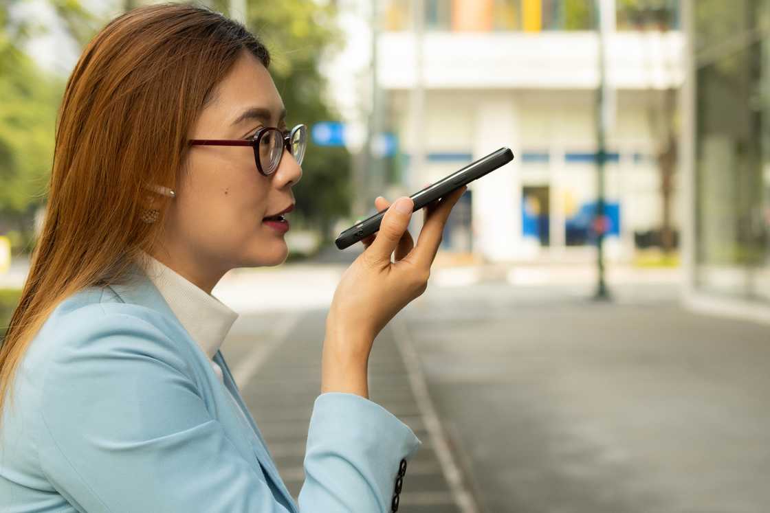 A woman talks on the phone