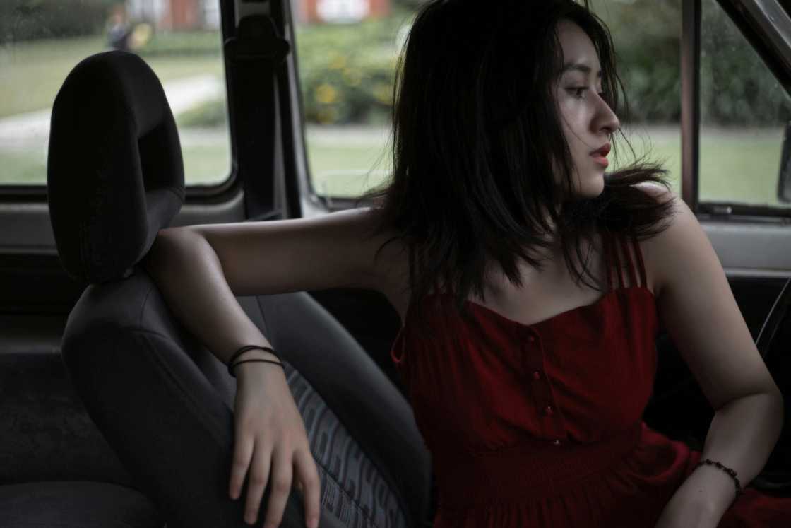 A stressed woman in a car