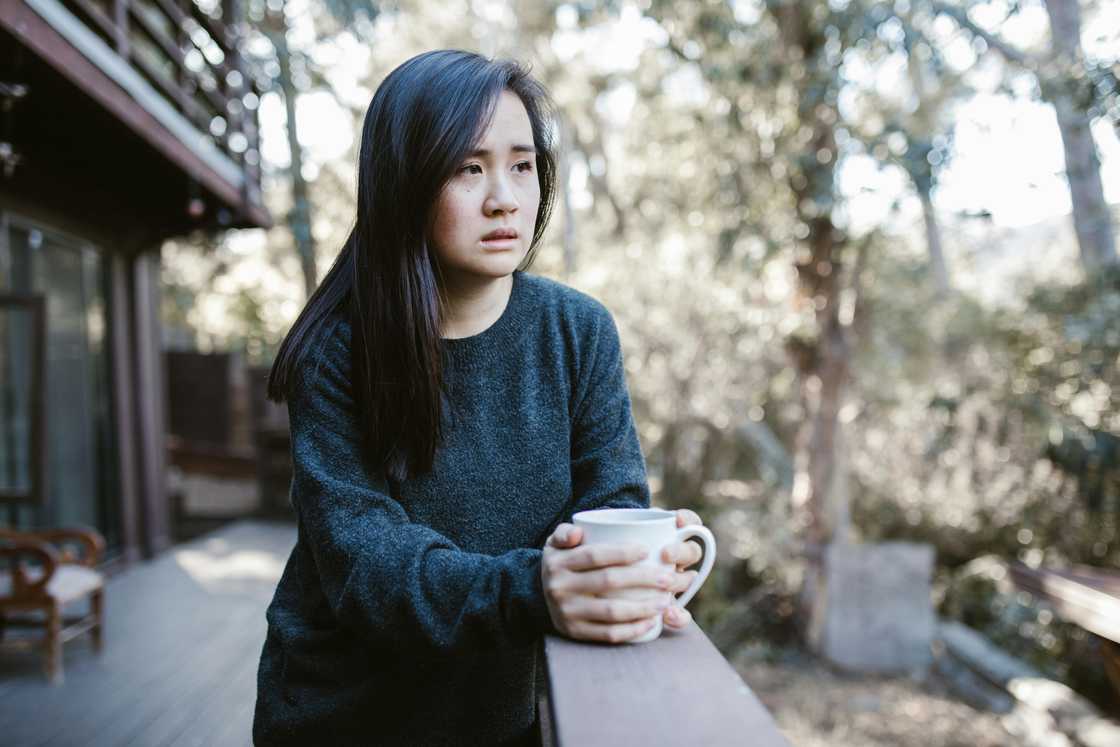A sad lady at a cafe A sad lady at a cafe