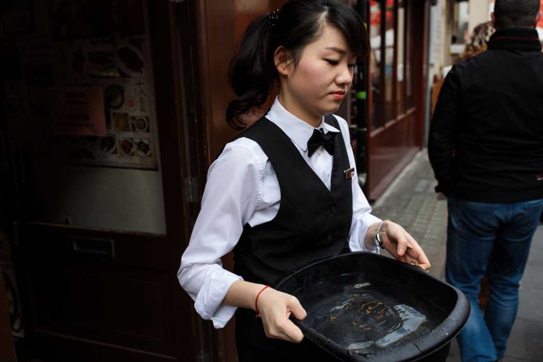 Filipino waitress working