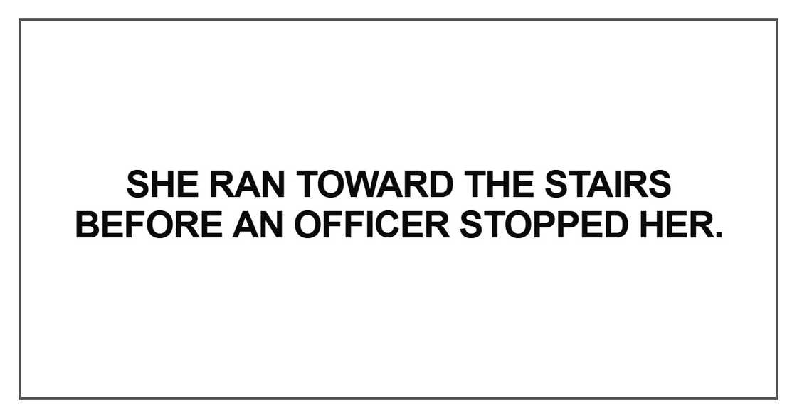 She ran toward the stairs before an officer She ran toward the stairs before an officer
