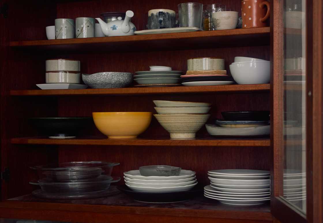 Plates in a kitchen cabinet