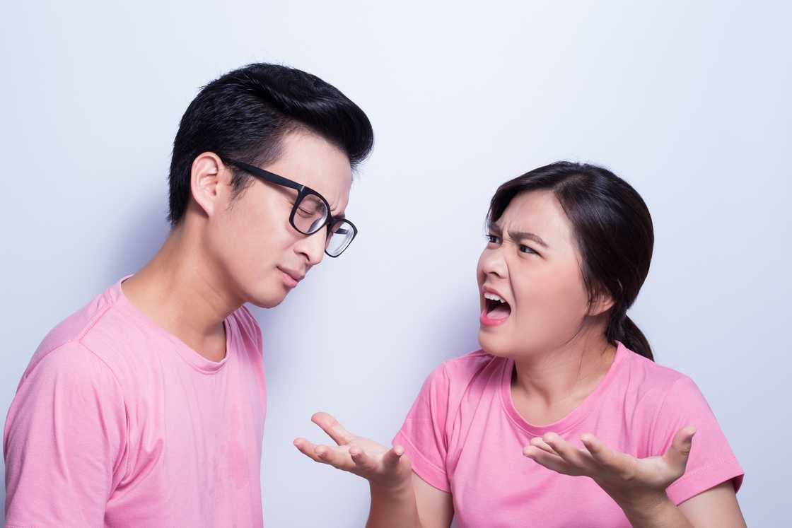 A man and woman arguing A man and woman arguing