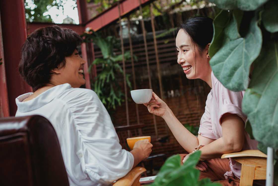 Two ladies at a cafe Two ladies at a cafe