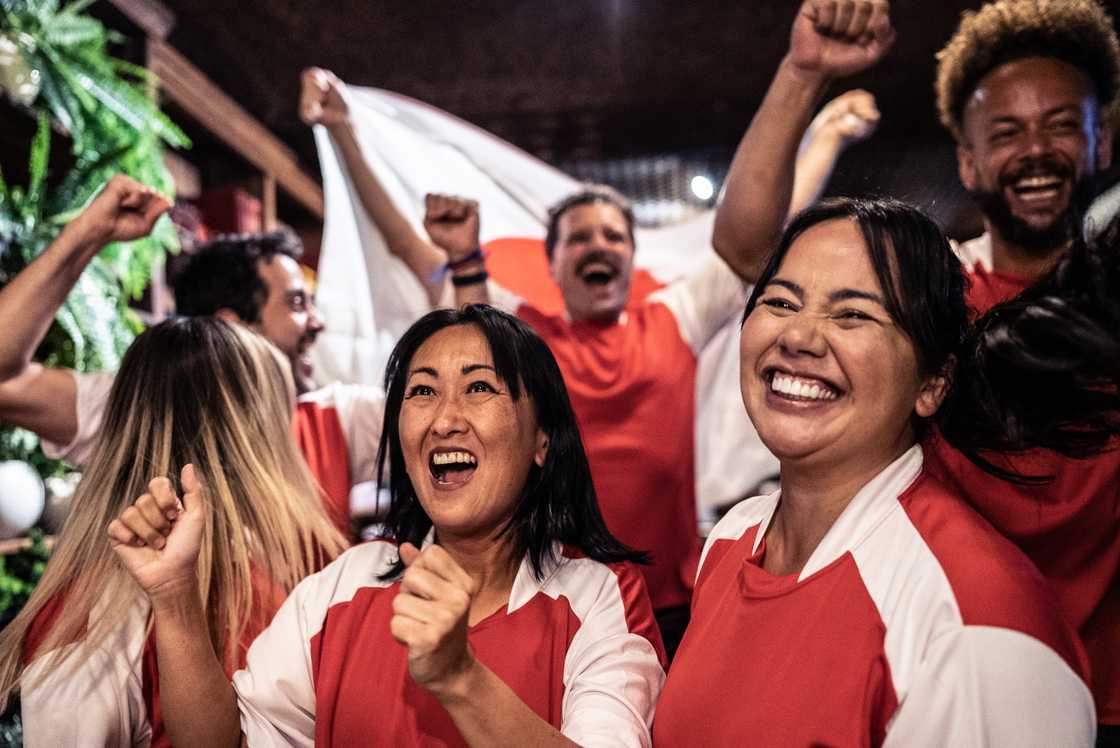 Fans watching a football match