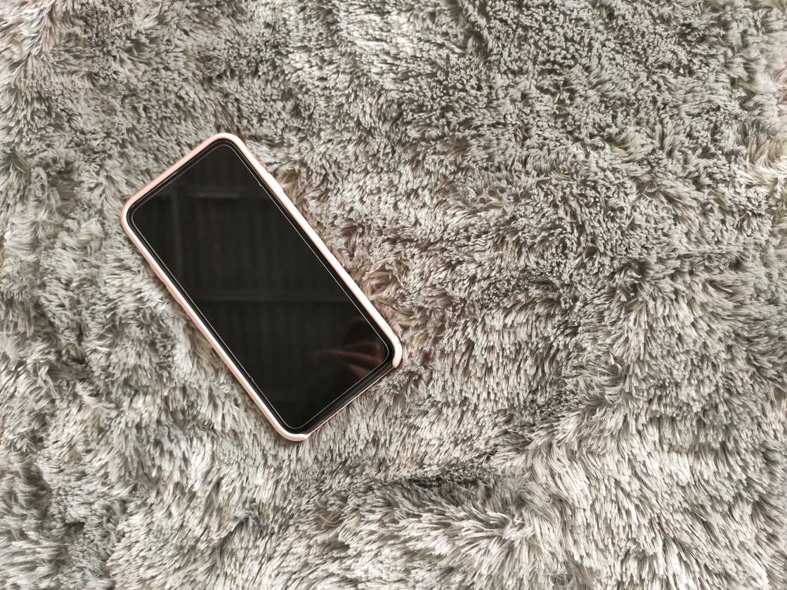 A phone on the carpet