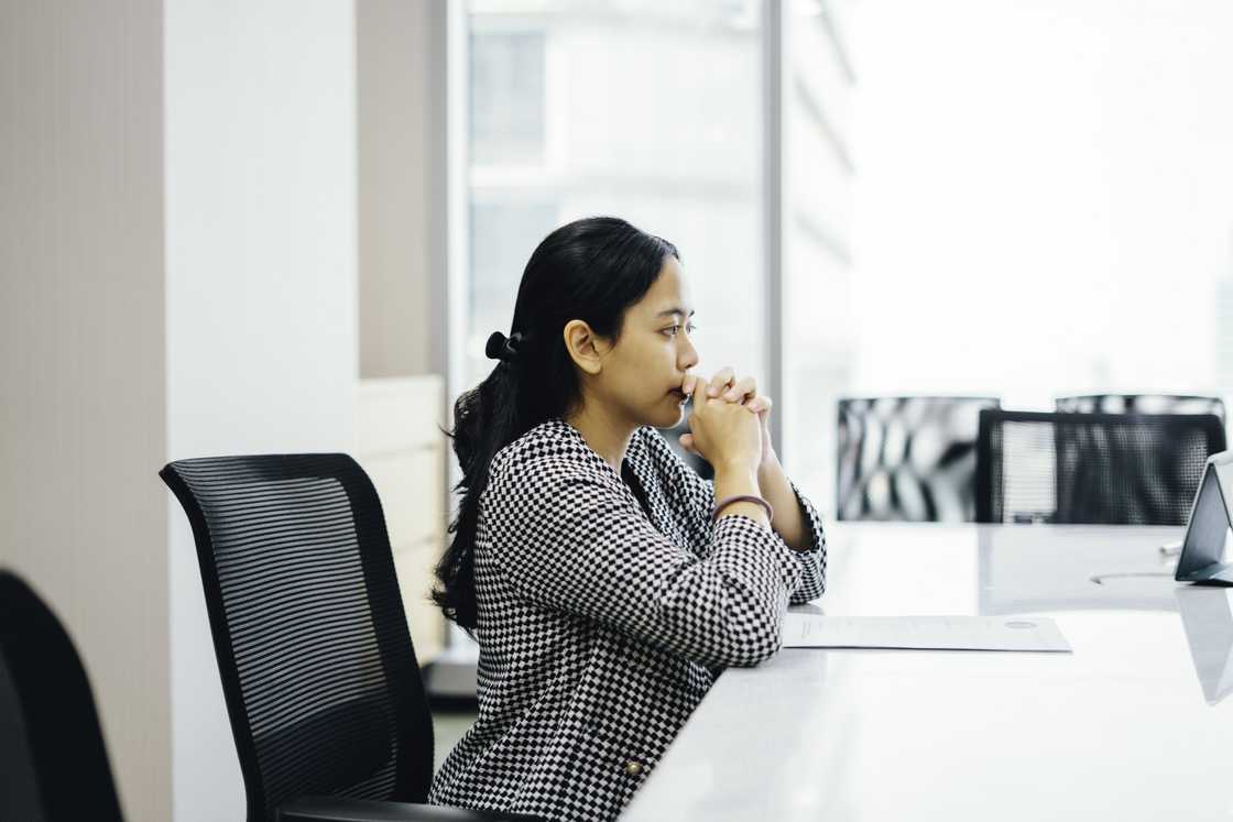 A distressed woman in the HR office A distressed woman in the HR office