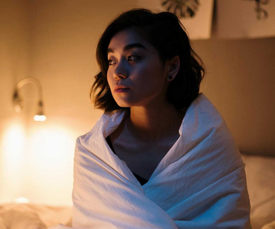 A fed up woman during bed time