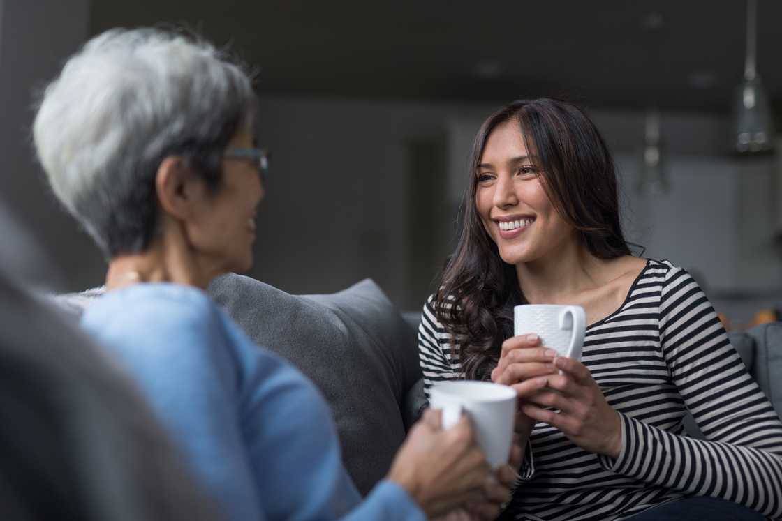 A mother and daughter chatting
