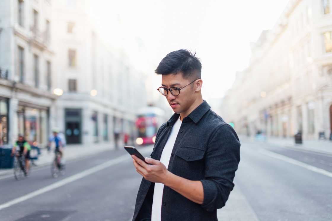 A man is talking on his phone A man is talking on his phone