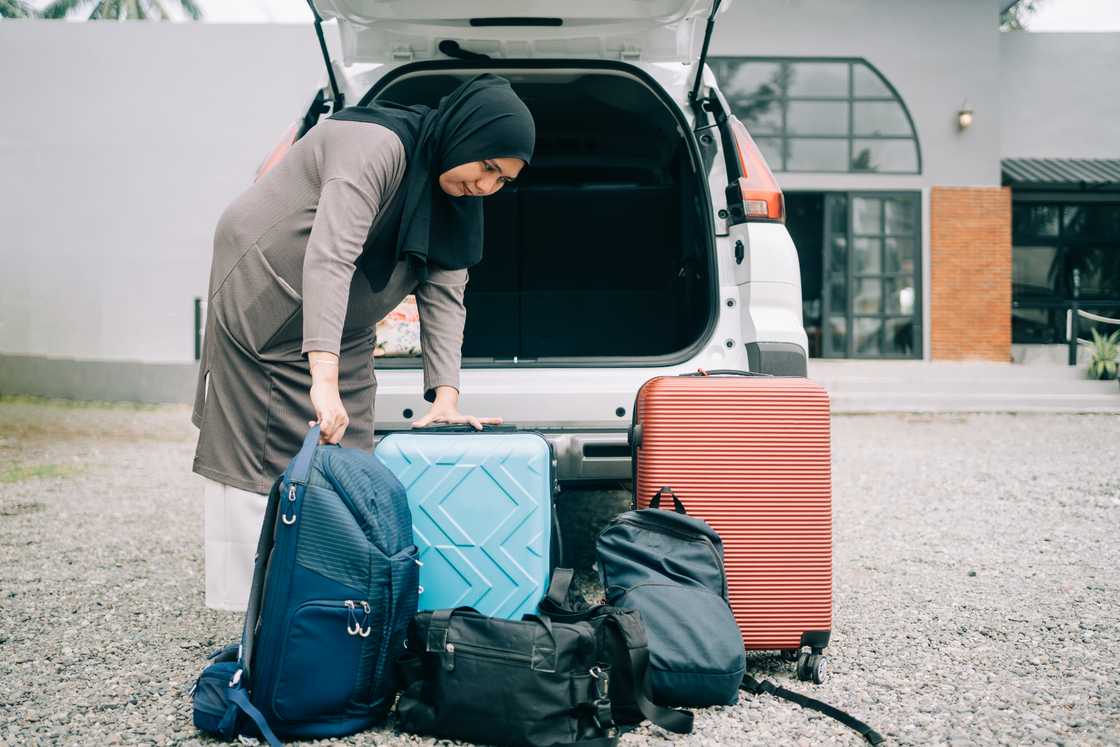 Muslim woman packing Muslim woman packing