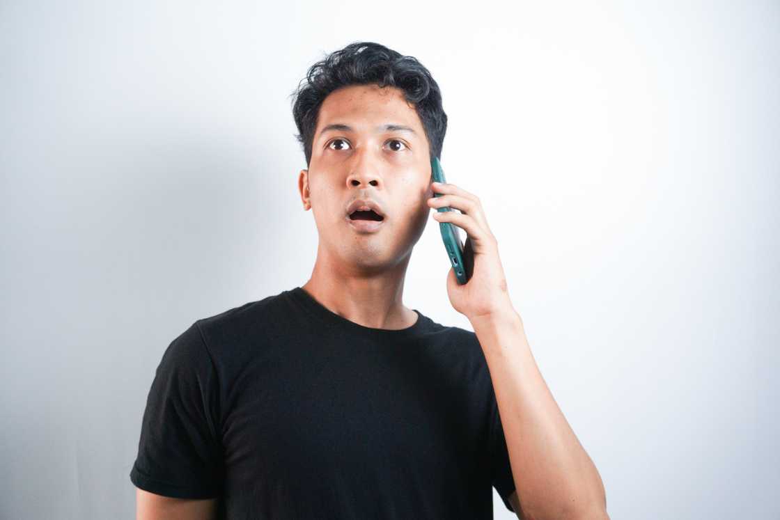 A sympathetic man on a phone call