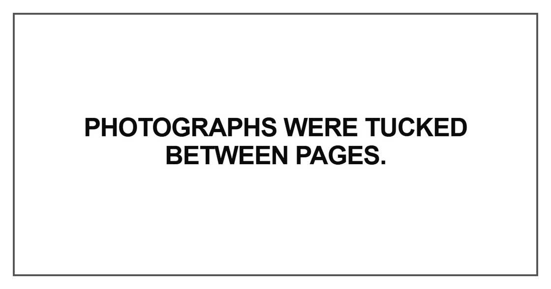 Photographs were tucked between pages Photographs were tucked between pages