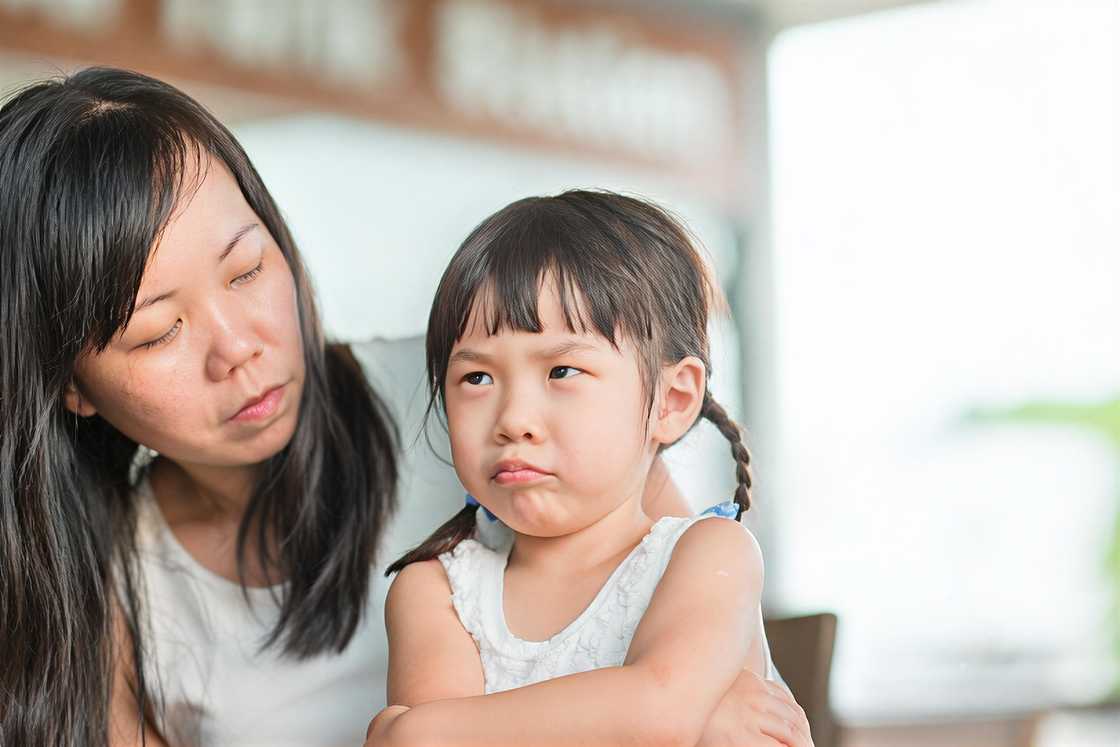An Asian mom and a little girl An Asian mom and a little girl