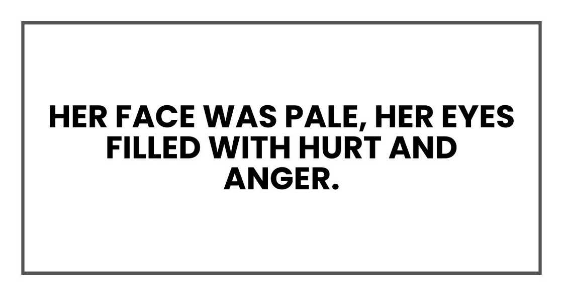 Her face was pale, her eyes filled with hurt and anger.